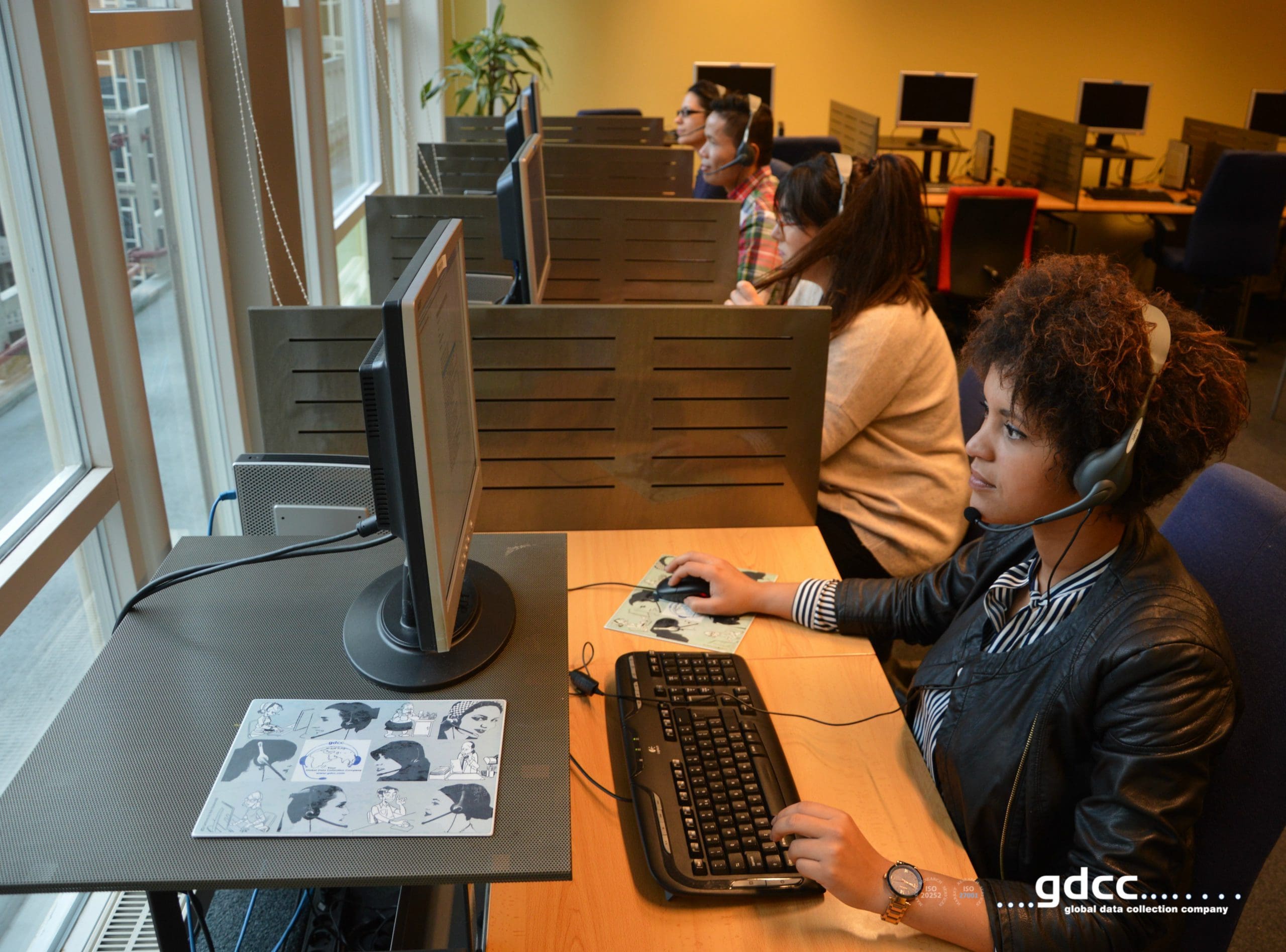 GDCC native- or near-native (C1 level) interviewing team at work in a centralized fieldwork facility